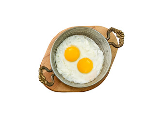 Fried egg. Close up view of the fried egg on a frying pan. isolated white background