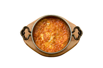 Menemen Turkish breakfast food egg, tomatoes and pepper in pan. İsolated white background