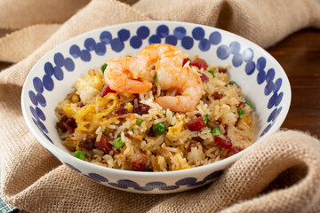 A view of a bowl of shrimp fried rice.