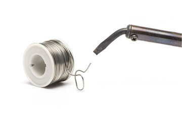 Closeup soldering iron roll of solder wire