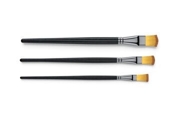 Blank paint brushes set mockup isolated on white background. make up brushes, beauty stylist accessories mock up template. 3d rendering.