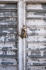 old iron door and rusty padlock
