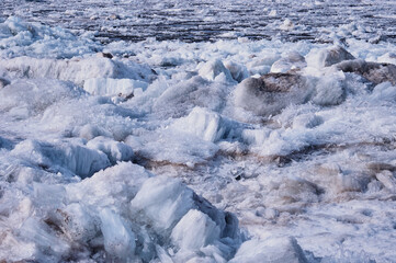 Ice blocks melt and disintegrate into needles.