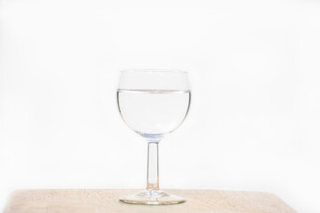 the glass of vodka on white background