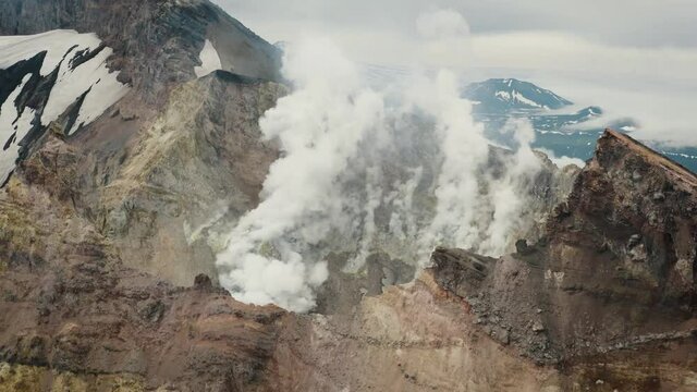 Fly Over the Ridge of Active Crater of Mutnovsky Volcano, Kamchatka