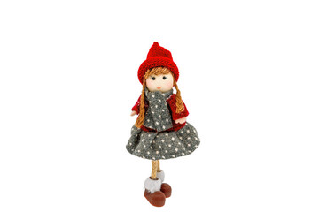 A small doll isolated on a white background