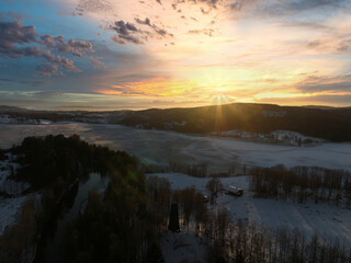 Sunrise over Oslo, Norway. Shot just outside of the city a winter morning in December. Shot high up in the sky with a drone. DJI Mavic 3