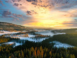 Sunrise over Oslo, Norway. Shot just outside of the city a winter morning in December. Shot high up in the sky with a drone. DJI Mavic 3