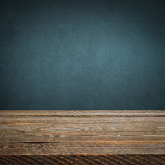 The background is blank wooden boards and a textured plastered wall with lighting and vignetting.