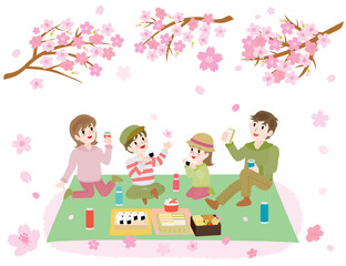 お花見をしながらお弁当を食べる家族
