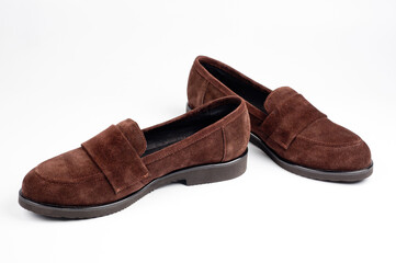 Dark brown suede slippers. Close-up shot.