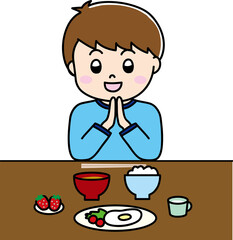 いただきますとごちそうさまをする子供