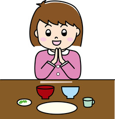 いただきますとごちそうさまをする子供