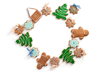 Christmas decoration round with gingerbread cookies on white background