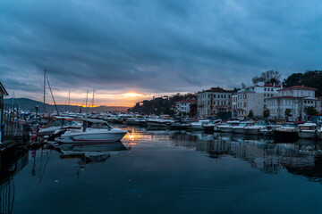 view of sailboats and yachts moored in the marina of  Istanbul, Turkey. Sunrise with colorful...