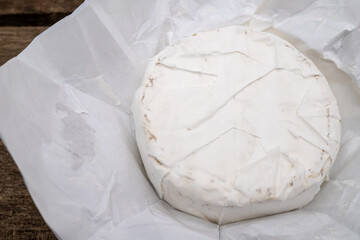 Photos of camembert cheese with white mold