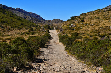 The rough park road through the boulder-filled high sector of Itatiaia National Park, Itatiaia, Rio...