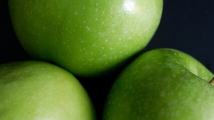 Close up of 3 Granny Smith apples
