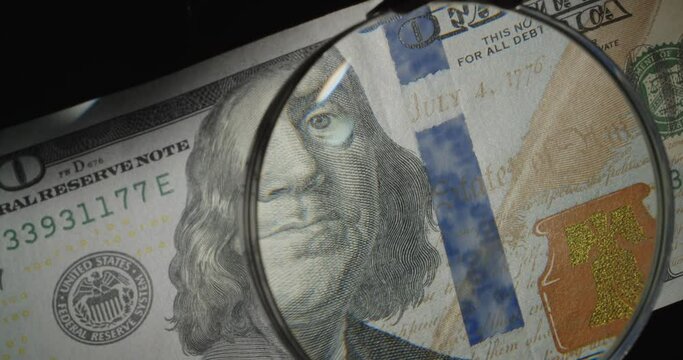 Benjamin Franklin on old US 100 dollar bill slow rotating