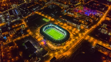 Rolgordijnen  Football. Stadium. Tribunes. Aerial photography 4K. © Юлия Чёрная