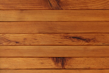 The texture of wooden planks stacked together. Background from wooden planks. 