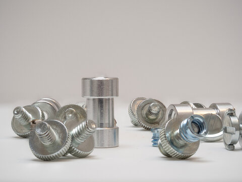 CNC machined aluminium bolts with screw threads and a bushing with female connector
