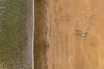 Overhead Beach Aerial with Surf lesson in progress