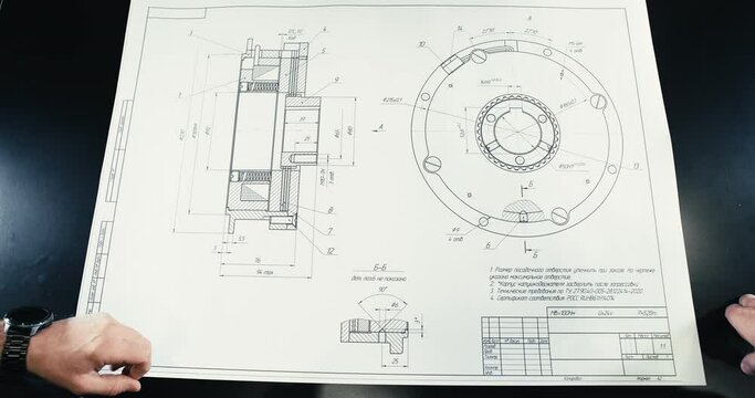contract for both companies. Design and structure concept of an engineer or architect meeting to work on a project with a partner and engineering tools to create a model and drawing in the workplace.