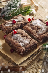 Chocolate Christmas biscuits with an imprint of a tree, a star and a shoe. selective focus
