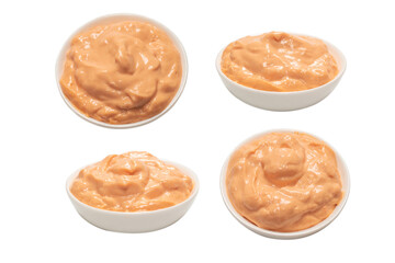 Sauce in a bowl isolated on white.