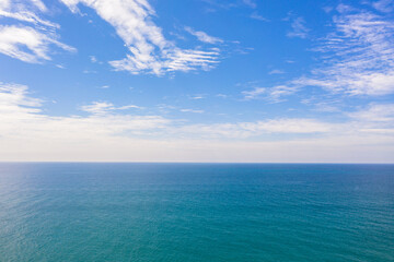 ..aerial view The emerald green waters of the Andaman Sea. .Wave after wave swept towards the shore. .emerald green sea, blue sea, and clear sand landscape. Paradise beach..