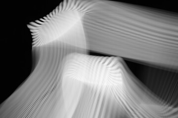 Black-white blurred light lines. abstraction of light.