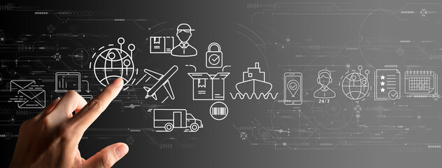 Businessman hand using Digital computer of global logistics network distribution and transportation Ui, Smart logistics, Innovation future of transport on grey background.