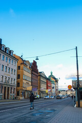 Fototapeta na wymiar Street of coloured buildings in the winter on the east side of Gamla Stan, Stockholm, Sweden