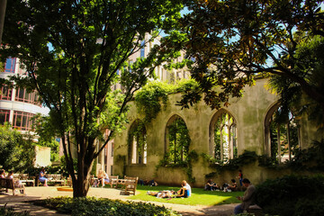 London residents relaxing in 'St. Dunstans in the east', a garden in the centre of London, UK.