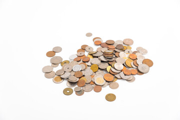 Many kind of coin country pile up on white background.