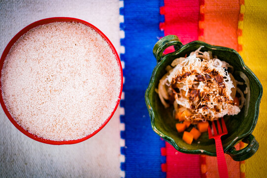 Tejate and piedrazo on colorful tablecloth 