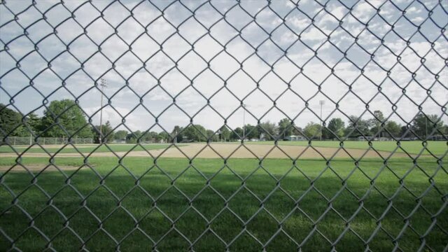 Baseball field through chain link fence