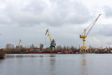 Fototapeta premium cranes in port