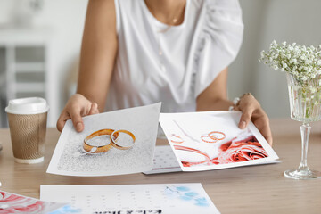 Female wedding planner working in office