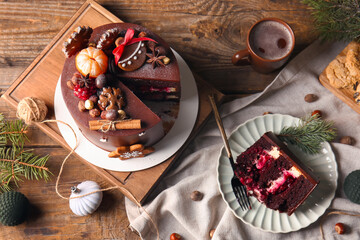 Composition with tasty Christmas chocolate cake on wooden background