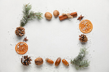 Beautiful composition with fir branches and snow on white background. Winter time
