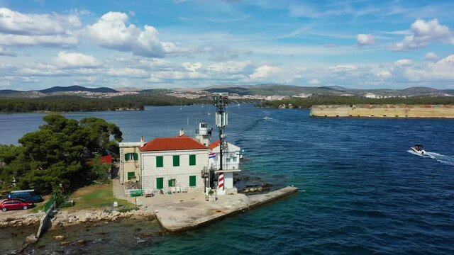 Jadrija lighthouse in Sibenik bay entrance aerial view, archipelago of Dalmatia, Croatia. Aerial view of lighthouse in town of Jadrija in Sibenik bay in Croatia, beautiful seascape.