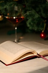 glasses of wine on a book
