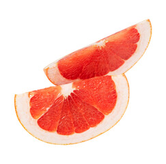Slices of two juicy grapefruit close-up isolated on a white background.