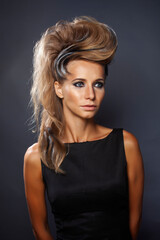 Naklejka premium young elegant woman with creative hair style zebra print close up pretty like punk studio halloween look fashion