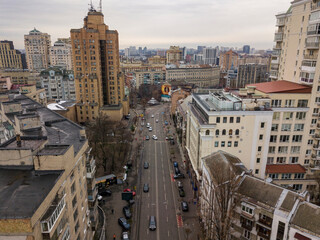Fototapeta premium City street in Kiev in cloudy weather. Aerial drone view.