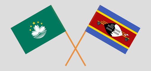 Crossed flags of Macau and Eswatini. Official colors. Correct proportion