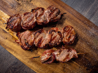 Homemade fillet skewers on a wooden board