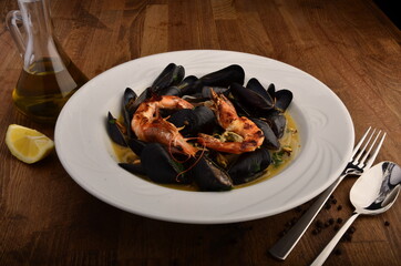 mussel and shrimp in white plate